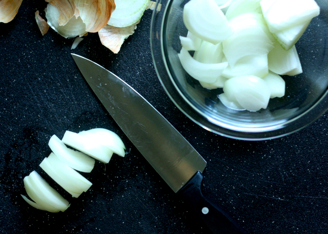 Cutting Board with Chopped Onions 