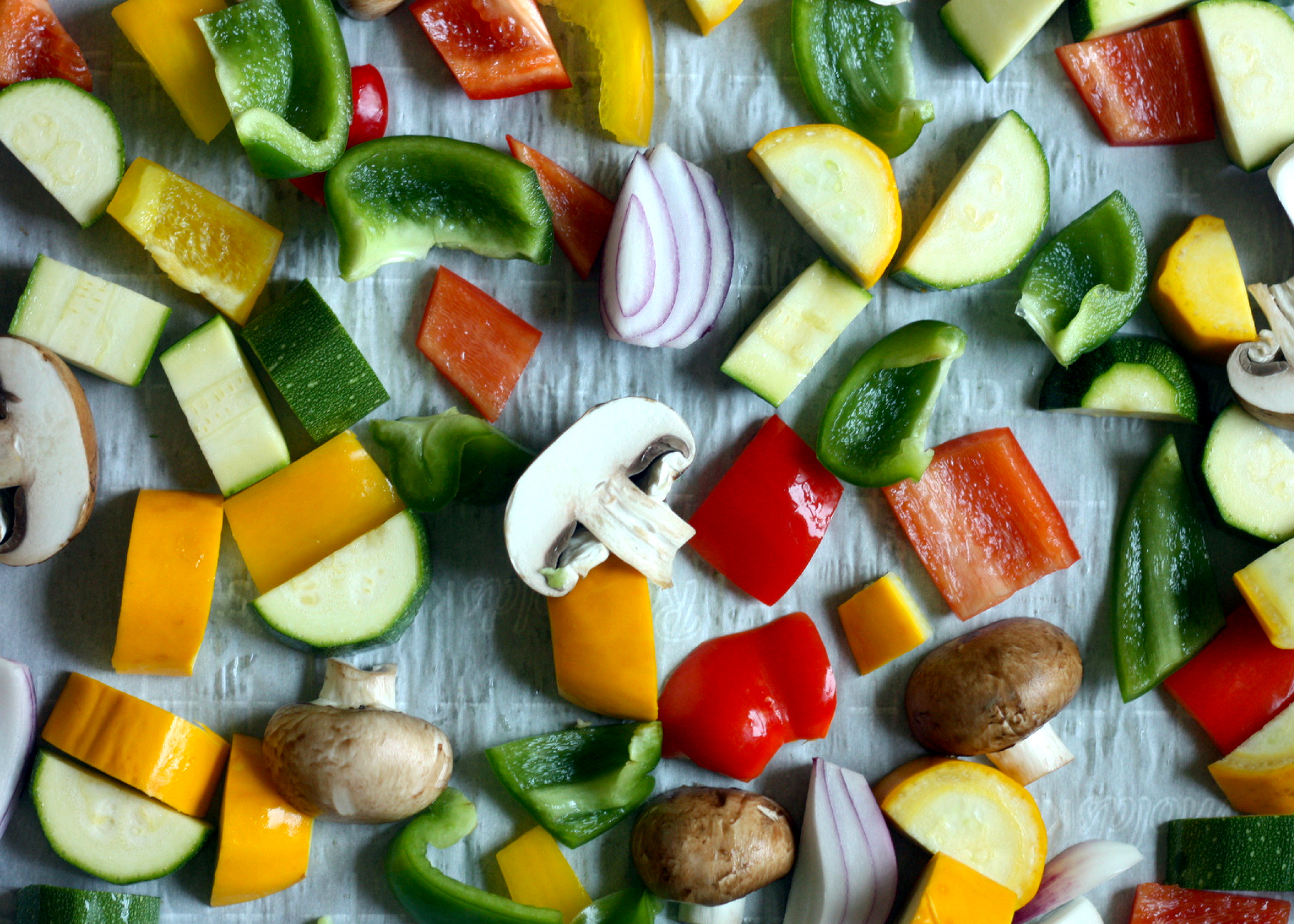 Chopped vegetables on a sheet pan
